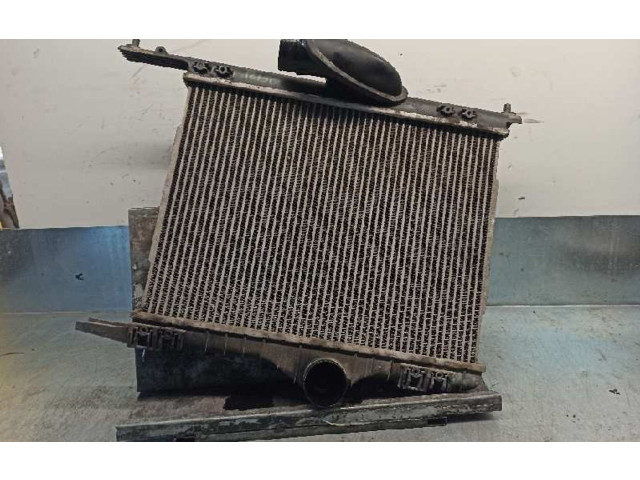 Интеркулер M613906 Mitsubishi Carisma