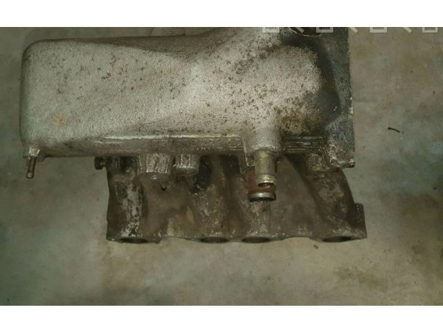 Всасывающий коллектор 037133223AD    Volkswagen Golf II