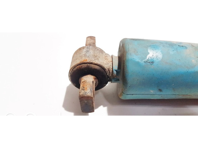 Задний aмортизатор