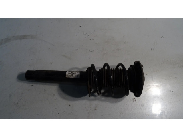 Передний амортизатор с пружиной      