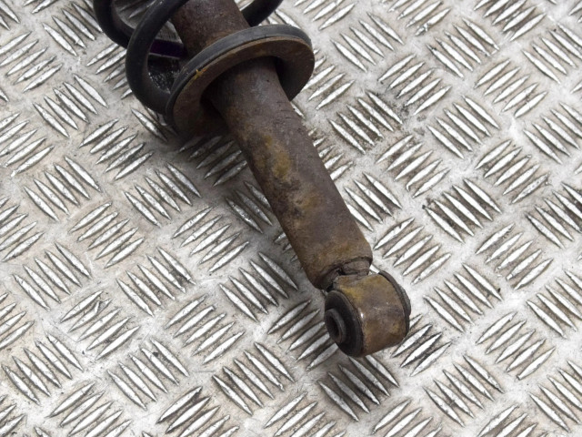 Передний амортизатор