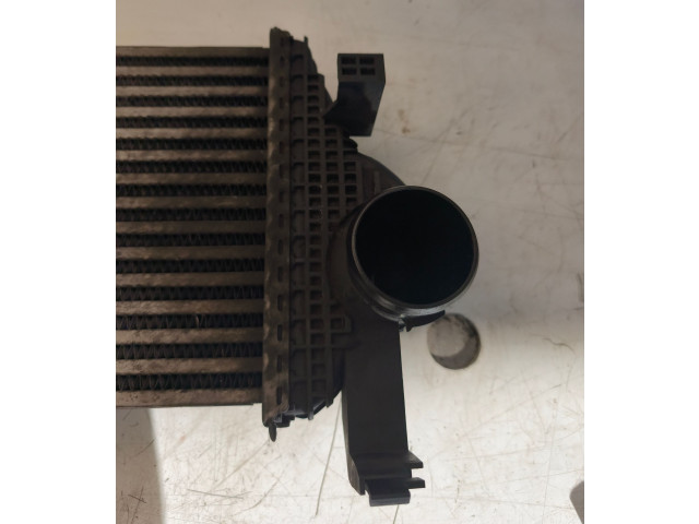 Интеркулер 55038006AE, 55038004AD Jeep Grand Cherokee