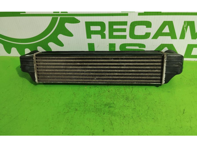 Интеркулер  77897930   BMW X3 E83 