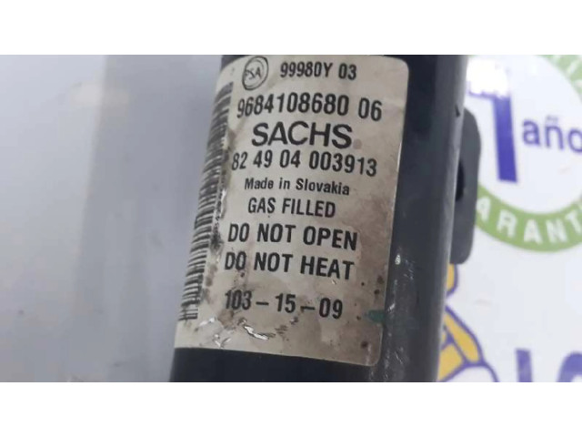 Передний амортизатор