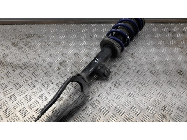 Передний амортизатор