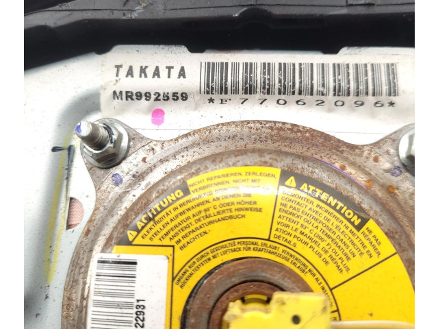 Подушка безопасности водителя MR992559, F77062096 Mitsubishi L200