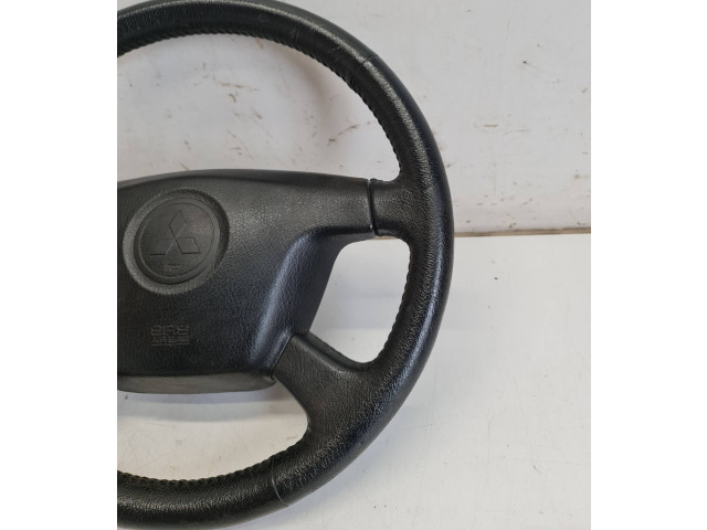 Руль Mitsubishi Lancer 2003 - 2007 года MR955737, TAK4TA