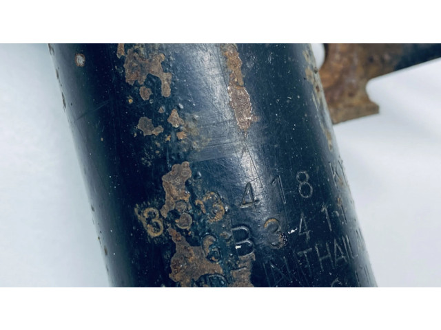 Передний амортизатор с пружиной      