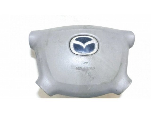 Подушка безопасности водителя lc6357k0005 Mazda Premacy