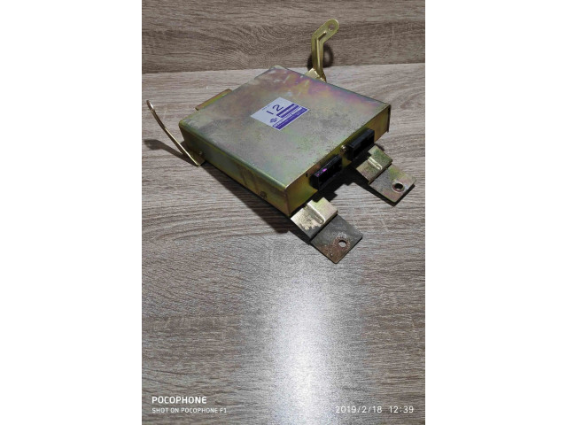 Řídící jednotka 2371066c00, a93b71565 Nissan Sunny 1991