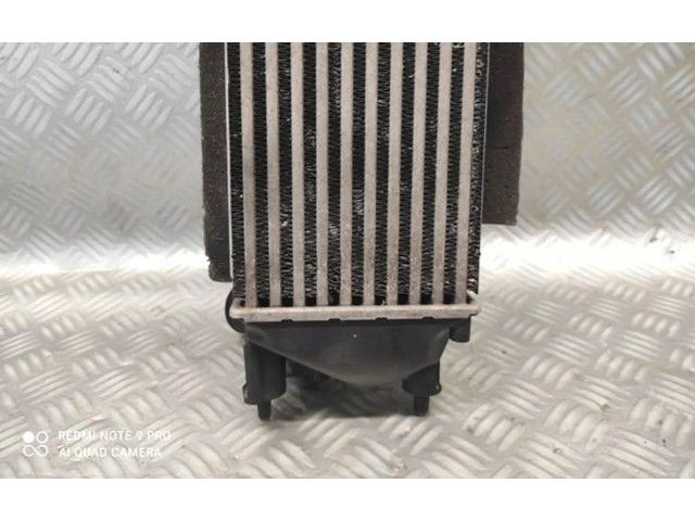 Интеркулер  C1B19L440AB   Ford Fiesta 