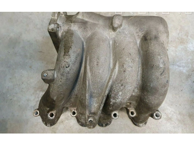 Всасывающий коллектор 037133223AD    Volkswagen Golf II