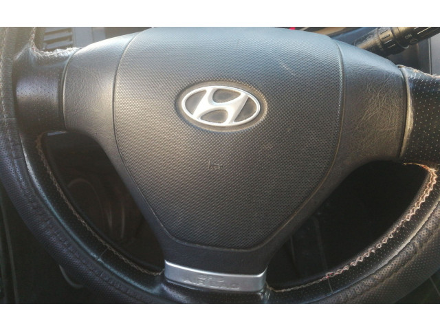 Подушка безопасности водителя    Hyundai Coupe