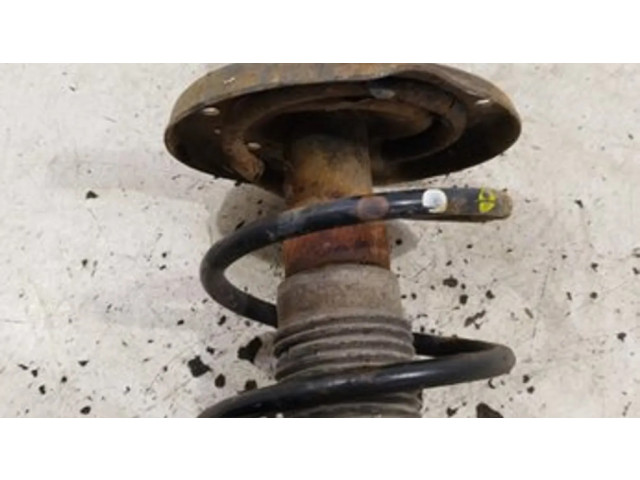 Передний амортизатор с пружиной      