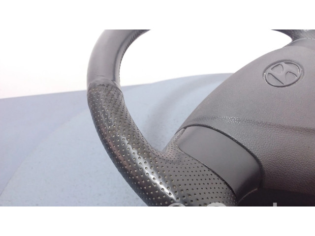 Руль Hyundai Getz 569001C600