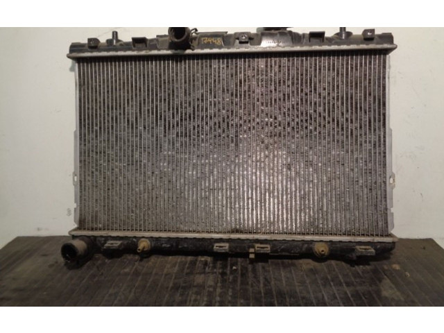 Радиатор охлаждающей жидкости    253102D000, 67494   Hyundai Coupe