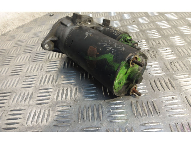 Стартер 0001110115 Opel Astra F