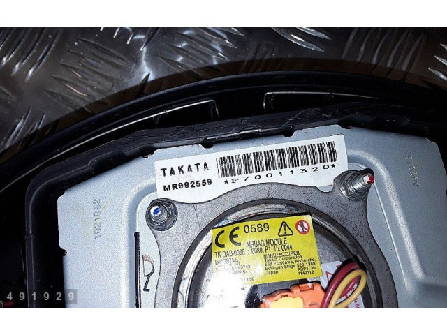 Подушка безопасности водителя MR992559 Mitsubishi L200