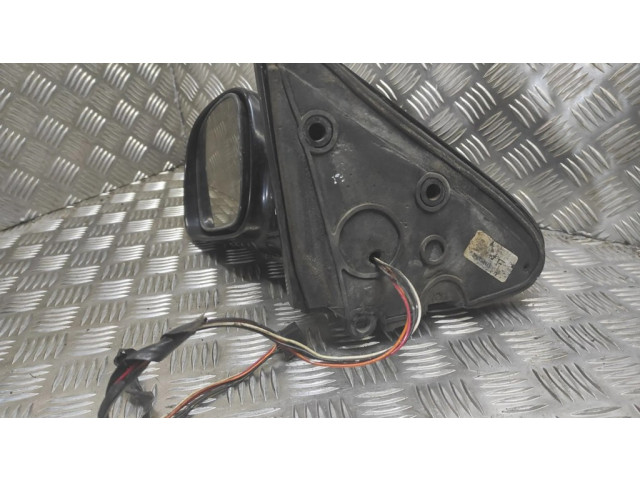 Zpětné zrcátko  levé Dodge Caravan 2003    