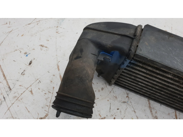 Интеркулер  6650758, 3453726   BMW X3 E83 2.0