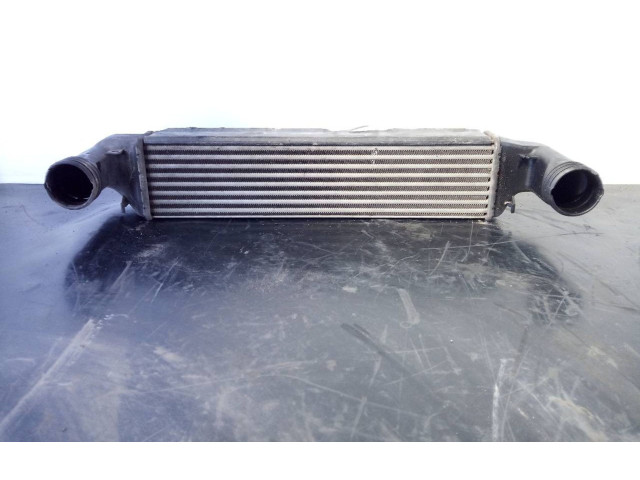 Интеркулер 77897930, 1787779 BMW X3 E83