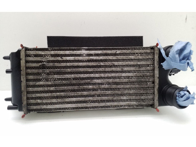 Интеркулер  0FT766K775BA   Ford Transit Courier 1.6