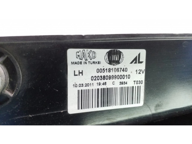 Задний фонарь левый 00518106740 Fiat Doblo 2010-2022 года