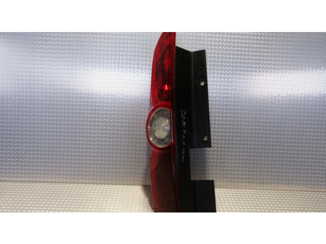 Задний фонарь левый 02038099900010 Fiat Doblo 2010-2022 года
