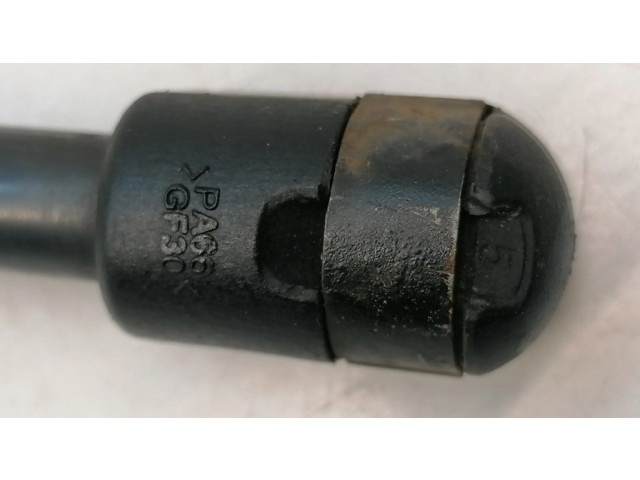 Амортизатор задней крышки