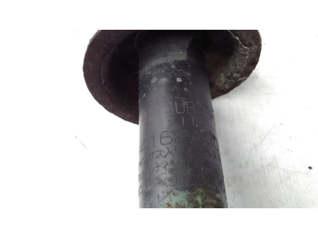 Задний aмортизатор