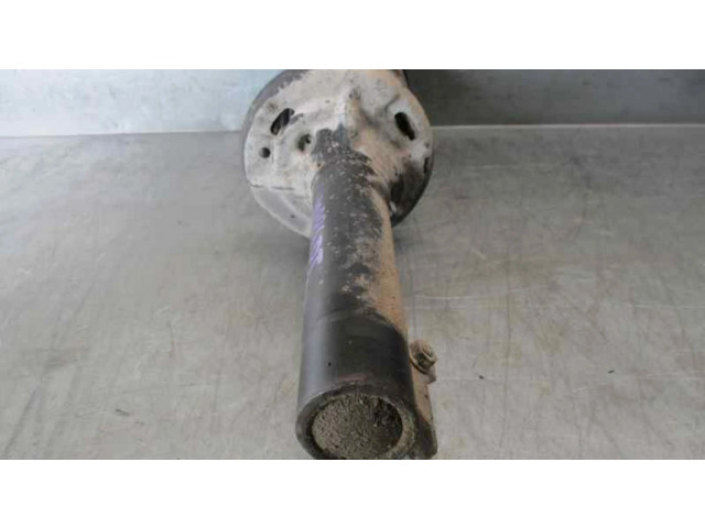 Передний амортизатор