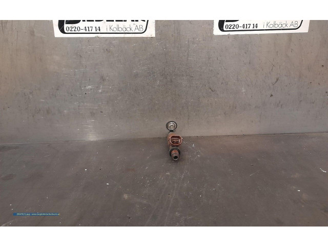 Vstřikovač 15710-54G00 Suzuki Liana