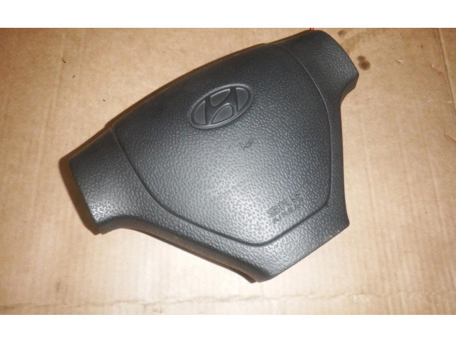 Подушка безопасности водителя 569001C000DB Hyundai Getz