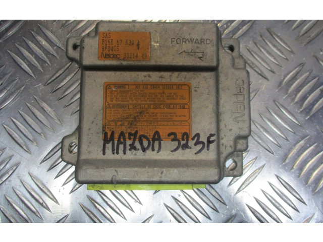 Блок подушек безопасности B25E57K30A   Mazda 323 F