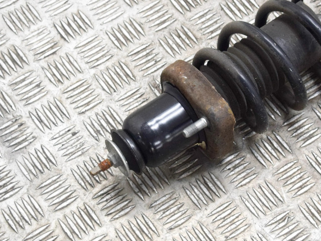 Передний амортизатор