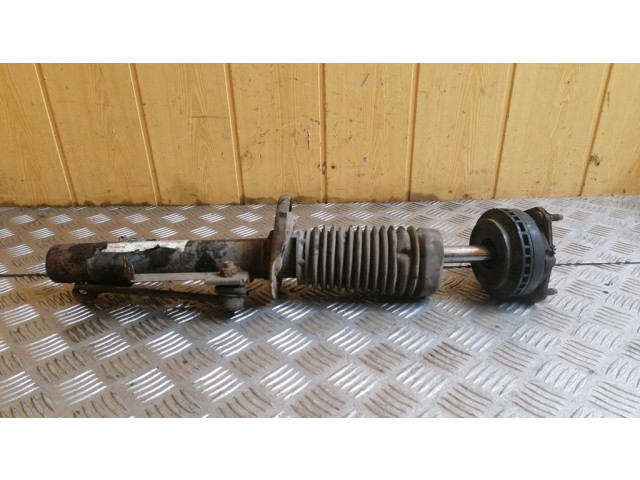 Передний амортизатор