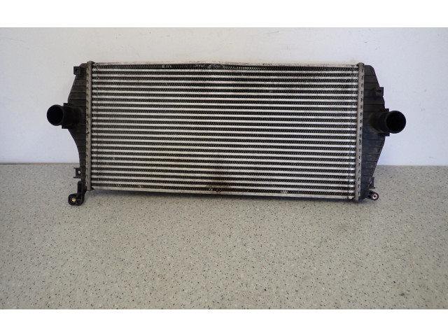 Радиатор интеркулера    KIA Carens II