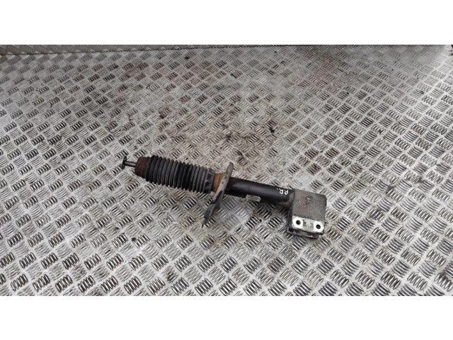 Передний амортизатор