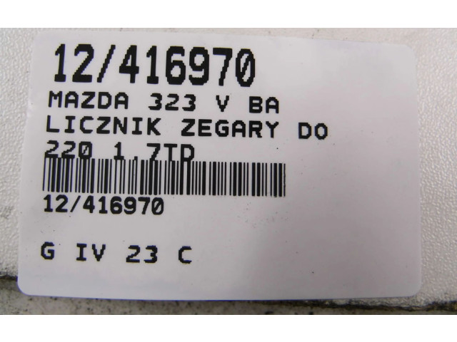 Панель приборов    Mazda 323 F       