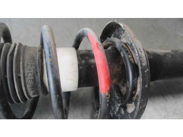 Передний амортизатор с пружиной