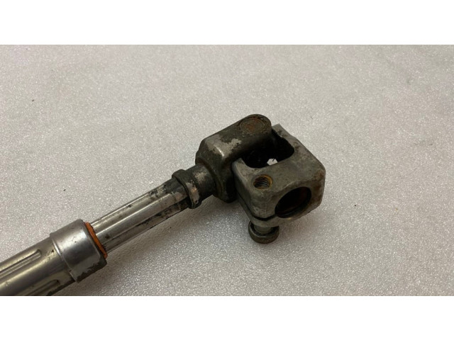 Крестовидная связь оси рулевого колеса