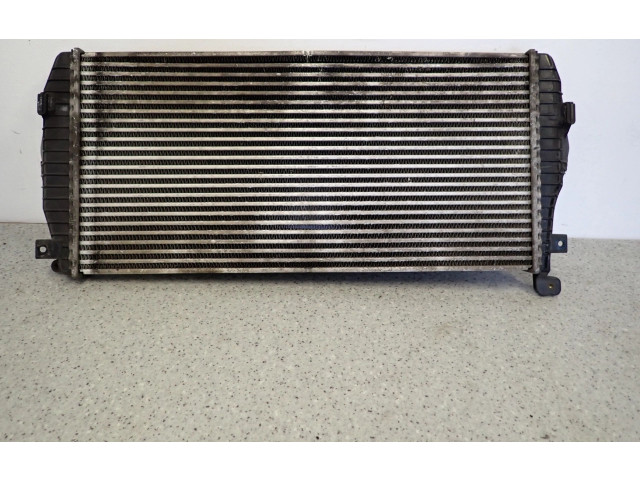 Радиатор интеркулера    KIA Carens II