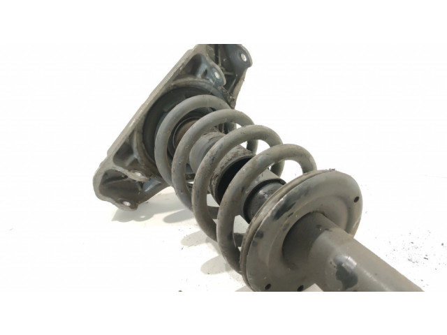 Передний амортизатор с пружиной      