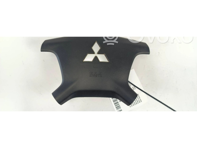 Подушка безопасности водителя 7030A099 Mitsubishi Pajero