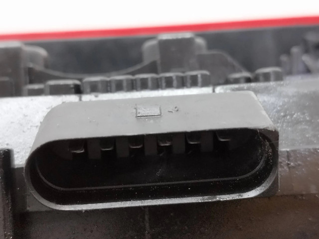 Задний фонарь левый 7H0945257A Volkswagen Transporter - Caravelle T5 2003-2015 года