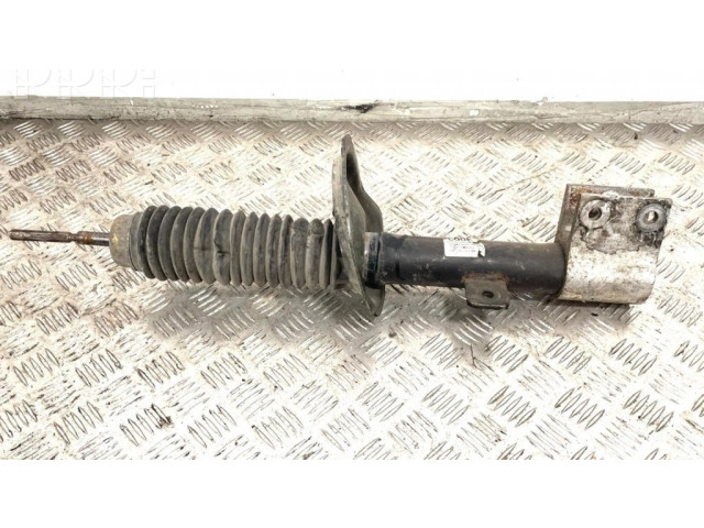 Передний амортизатор