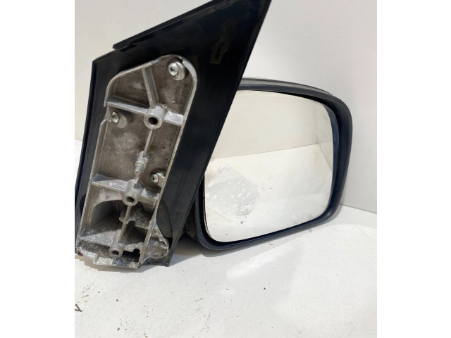 Zpětné zrcátko  Volkswagen Caddy 2006  E11026035, 026035  