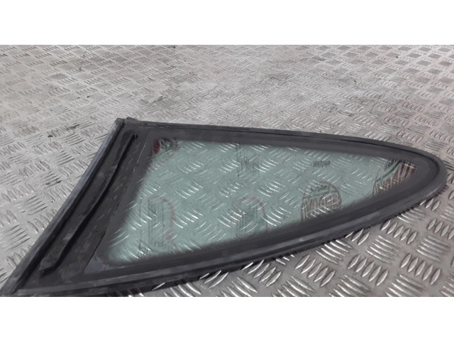 Заднее боковое стекло кузова