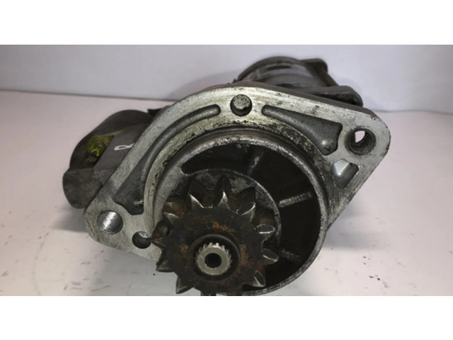 Стартер 23300VK500, M002TS0571 Nissan Navara D40