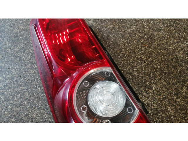 Задний фонарь левый 00518106740 Fiat Doblo 2010-2022 года